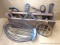 Yard art or decorative pieces including buggy step, tractor crank handle, chain, pliers, more comes