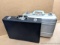 Two hard handgun cases with combination locks. Both in good condition and each about 18