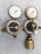 Smith oxygen and fuel gas torch regulators. Fuel regulator appears to have a new style propane