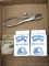 Decker's Hump brand Hill's Shoat Rings, Lem Manual Hog Rings, and Decker's Ringer Plier. Plier