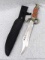 Unique serpent design fixed blade knife with sheath. Measures 15