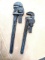 Pair of pipe wrenches, smaller is Craftsman 14; other may be a Lake 18?