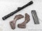Seven round 1911 magazine, rifle scope, and clip on quiver.