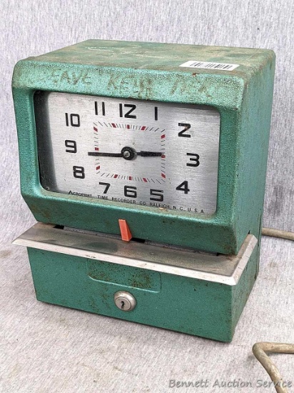 Vintage Acroprint Time Clock from like your work had back in the day. Sounds like it keeps time.