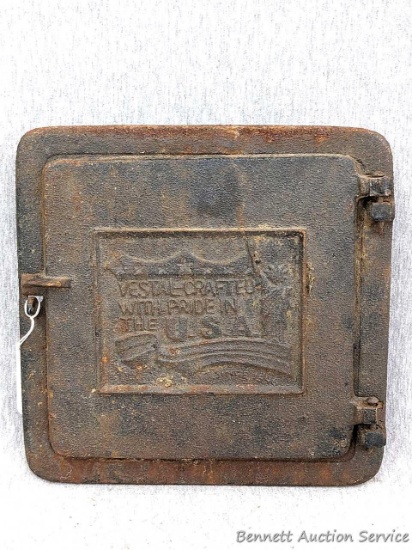 Vestal drafted cast iron wood stove door was made in the USA. Measures 10-1/8" x 10-1/2" over frame
