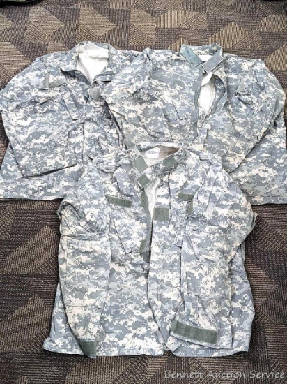 US Military Army digital camouflage combat uniform coats are all Large Regular. A little