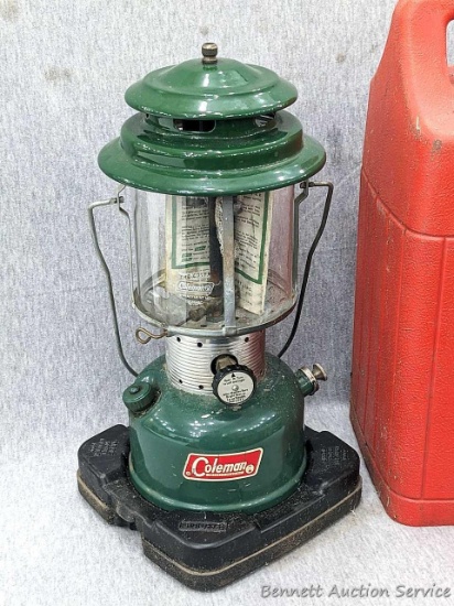 Coleman double mantle lantern with case is Model 220F. Bottom date coded 4 69. In pretty nice