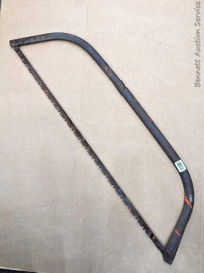 Bow saw is nearly 4' long.