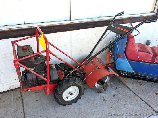 Plow bank grinder or rototiller depending on the season. Ariens Model RT5020 rear tine tiller with a