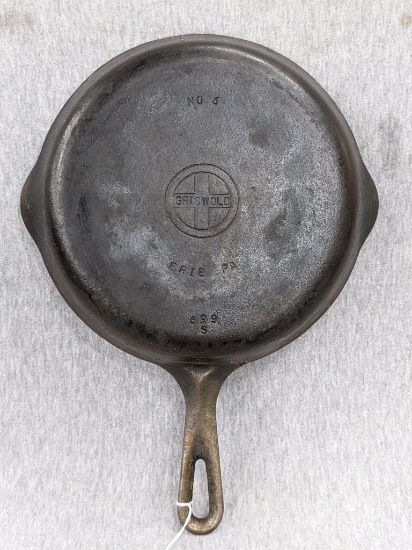 Griswold No. 6 cast iron skillet is marked Erie PA and 699 S. Measures 9" across rim. Season and