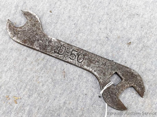 Vintage John Deer open end wrench with a 3/8" square hole. The wrench is 6" overall and is marked