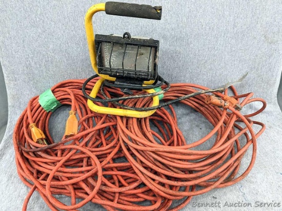 Work light about 7" wide, plus two extension cords very long and short- to - medium length. Cord