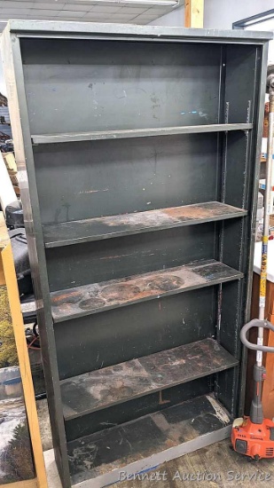 6' tall steel shelving unit with positionable shelves is 3' wide and 10" deep.