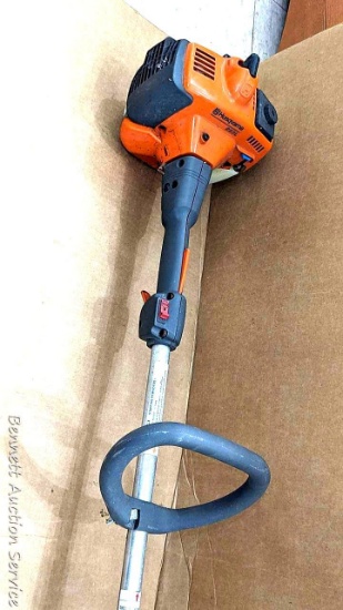 Husqvarna 223L E-Tech weed whacker / string trimmer is about 6' long. Gas tank is dry but engine