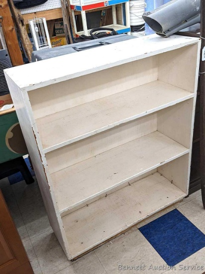 Nice wooden shelving unit is sturdy and measures 34" x 42" x 12".