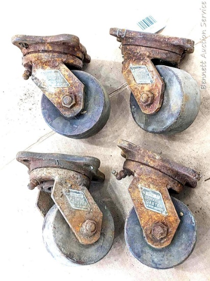 Set of four 4" service casters need a little oil as some don't turn right now. Use on a project.