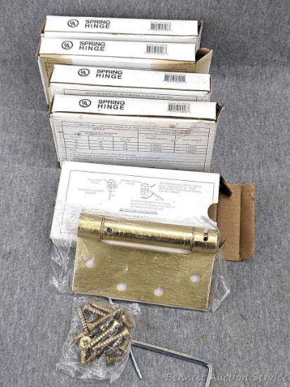 Five quality spring hinges by Deltana measure 4.5" x 4.5" x 3.4". Four Satin Brass finish, one