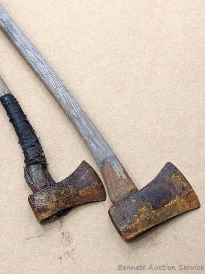 Standard size single bit axe by Olympia, and a smaller camp axe. Smaller's handle is very loose.