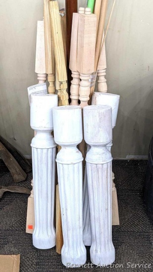 Various spindles, wooden dowels, stairway handle, possibly more. Chunky white wooden pedestals are