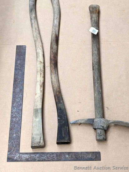 34" and 36" axe handles, grub hoe with 12" head, carpenters square.