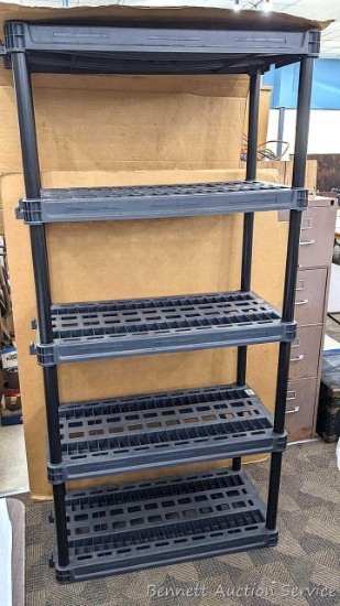Nice Plano shelving unit is 3' wide, One crack noted on shelf but otherwise looks good. Handy for