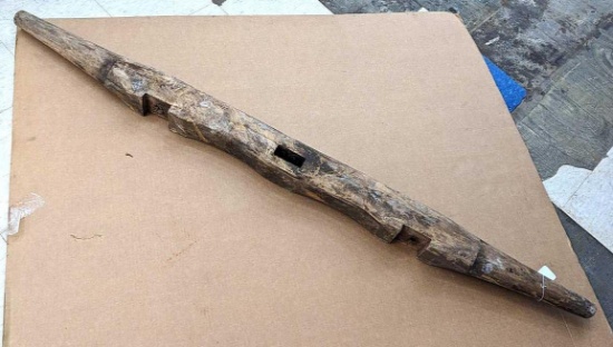 Is this an old wooden wagon axel? Super neat piece is 69" long and would make an awesome light