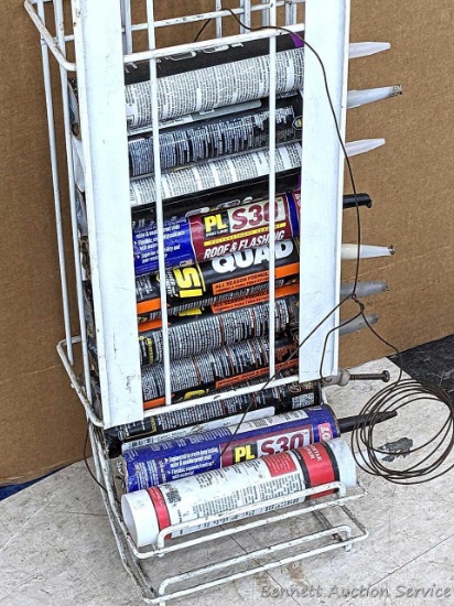 Caulk organizer is nearly 3' tall. Content incl roof cement, flashing caulk, window, door and siding