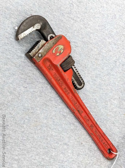Toledo 12" pipe wrench with nice and pretty sharp jaws.