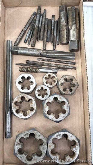 Taps, dies, and ream. The largest die is marked GTD and 1 1/2", largest tap is 3/4 R.
