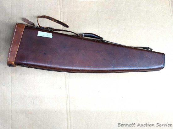 Very nice rifle gun boot is about 33" long. Leather in nice condition. Hinge is torn but lining