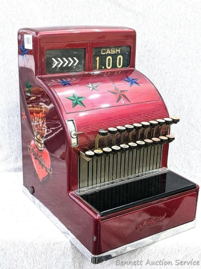 Neat old National cash register has been updated with a new custom air brushed paint job and great