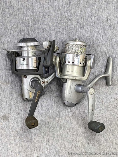 Two Zebco Quantum spinning reels. One is Kinetic KT30 PTi, the other a SS 4 Long Stroke.