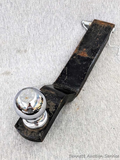 Light duty hitch with a 2" ball and a 2" x 1 3/8" receiver side.
