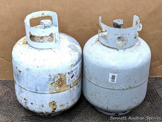 No shipping. Two empty or nearly empty 20 lb propane tanks have newer style OPD valve.