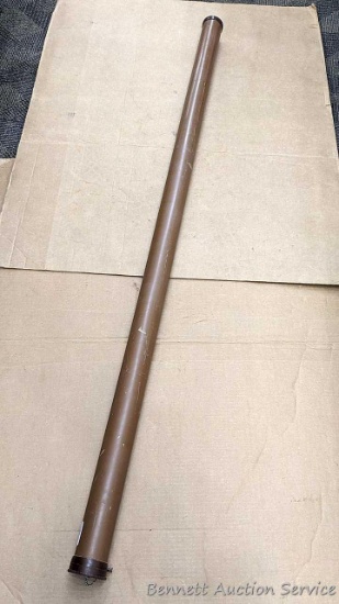 Hard plastic fishing pole carrying case measures 68" overall. Screw on / off cover and a holey end