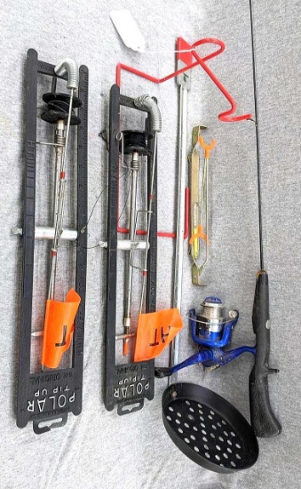 Two Polar Tip-Ups, Shakespeare ice fishing rod, a couple of rod holders and an ice fishing scoop.