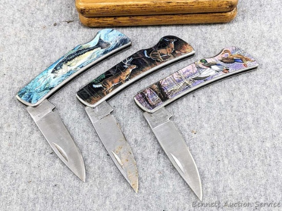 Trio of sporting folding pocket knives. Each knife measures 5-7/8" overall and each features