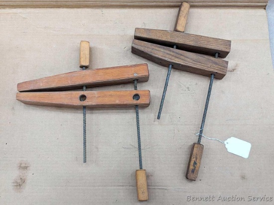 Pair of adjustable wooden claps with 14" long wooden jaws.