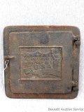 Vestal drafted cast iron wood stove door was made in the USA. Measures 10-1/8