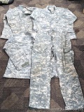 US Military Army digital camouflage combat uniform and two extra coats of the same type. All coats
