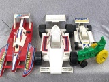 Vintage racecars, RC Thunder Hawk boat, tractor. Longer racecar is about 18