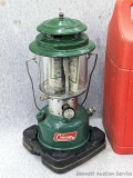 Coleman double mantle lantern with case is Model 220F. Bottom date coded 4 69. In pretty nice