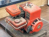 Briggs & Stratton 2hp Easy Spin engine outfitted with 3-jaw couple. Engine has compression but tank