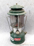 Coleman Model 220F dual-mantle lantern is date coded 12 67 on bottom. Stands 14