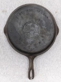 Griswold No. 8 cast iron skillet with large logo is marked Erie PA USA, 704 P. Measures 10-1/2
