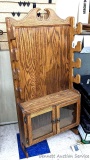 Very nice gun rack holds 4 rifles or shotguns and has storage cabinet underneath for handguns or