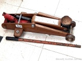 Floor jack with handle raises to about 15