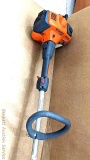 Husqvarna 223L E-Tech weed whacker / string trimmer is about 6' long. Gas tank is dry but engine