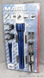 NIP Mag Lite flashlight set comes with batteries for both and mounting brackets. Shock and weather
