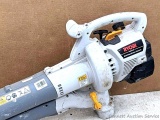 Ryobi mulching blower vacuum is Model RGBV3100. Measures about 4' overall. Tank is dry but has